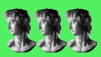 Three greek statue heads on green bakground