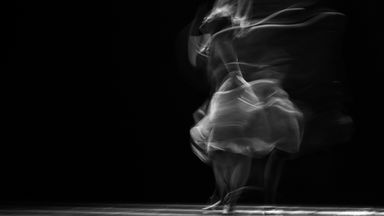 Blurred image of a dancer.