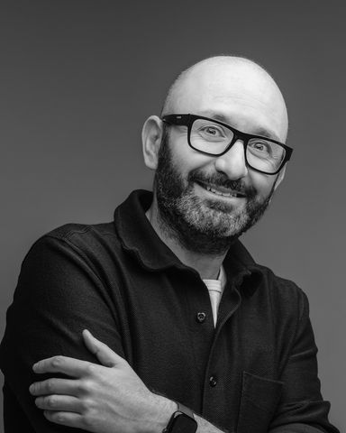 Black and white profile photo of Vadim Feldman